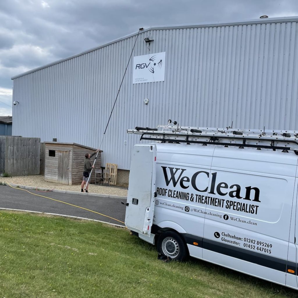 Cleaning industrial building with brush